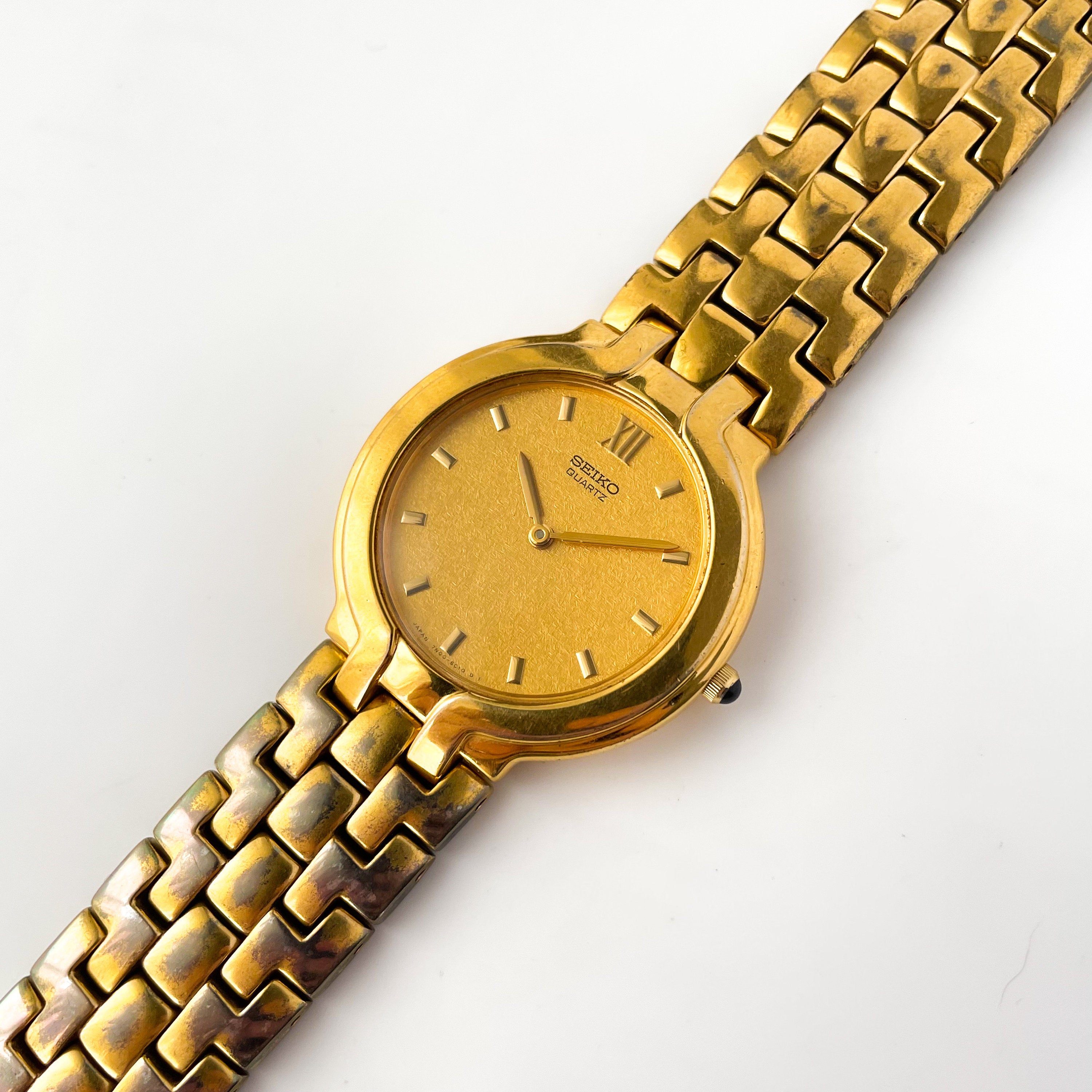 Seiko gold quartz outlet watch