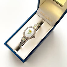 Load image into Gallery viewer, Vintage André Mouche Quartz Watch with Enamel Floral Design, Concealed Dial and Silver-Tone Bangle Bracelet
