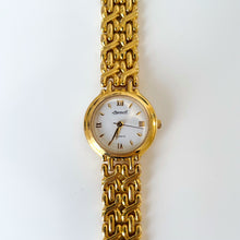 Load image into Gallery viewer, Vintage Ladies&#39; Ingersoll Quartz Watch with Intricate Gold-Tone Bracelet and White Dial
