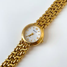 Load image into Gallery viewer, Vintage Ladies&#39; Ingersoll Quartz Watch with Intricate Gold-Tone Bracelet and White Dial
