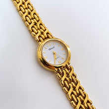 Load image into Gallery viewer, Vintage Ladies&#39; Ingersoll Quartz Watch with Intricate Gold-Tone Bracelet and White Dial
