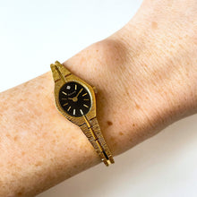 Load image into Gallery viewer, Gold-Tone Accurist Ladies Quartz Watch with Black Oval Dial
