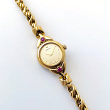 Load image into Gallery viewer, Very Rare 1990 Gold-Plated Seiko Jewellery Quartz Watch with Tiny Dial, Thin Twisted Bracelet and Two Rubies
