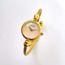 Load image into Gallery viewer, Vintage Ladies&#39; Gold-Tone Gucci Bangle Quartz Watch with Mother of Pearl Dial
