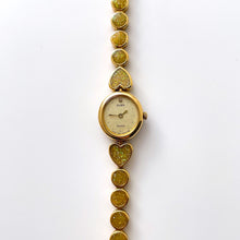 Load image into Gallery viewer, Vintage 1990s Gold-Tone Ladies&#39; Seiko Alba Quartz Watch With Heart Pattern
