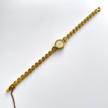 Load image into Gallery viewer, Vintage 1990s Gold-Tone Ladies&#39; Seiko Alba Quartz Watch With Heart Pattern
