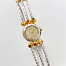 Load image into Gallery viewer, Very Rare 1990s Two-Tone Seiko Articulated Bangle Quartz Watch with Three Coloured Gemstones
