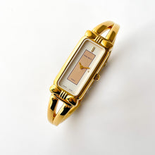 Load image into Gallery viewer, Vintage 1990s Gold-Plated Ladies&#39; Nina Ricci Bangle Quartz Watch with Rectangular Dial
