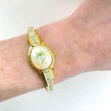 Load image into Gallery viewer, Vintage André Mouche Quartz Watch with Enamel Floral Design, Concealead Dial and Gold-Plated Bangle Bracelet
