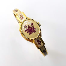 Load image into Gallery viewer, Vintage André Mouche Quartz Watch with Pearl and Burgundy Enamel Floral Design, Concealed Dial and Gold-Plated Bangle Bracelet
