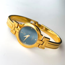 Load image into Gallery viewer, Vintage 1990s Gold-Plated Ladies&#39; Givenchy Bangle Watch with Blue Dial and Quartz Movement
