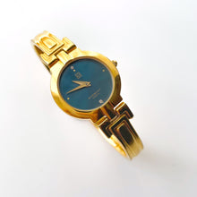 Load image into Gallery viewer, Vintage 1990s Gold-Plated Ladies&#39; Givenchy Bangle Watch with Blue Dial and Quartz Movement
