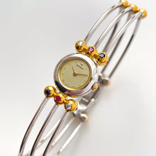 Load image into Gallery viewer, Very Rare 1990s Two-Tone Seiko Articulated Bangle Quartz Watch with Three Coloured Gemstones
