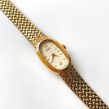 Load image into Gallery viewer, 1990s Ladies&#39; Gold-Tone Seiko Quartz Watch with Oval Dial and Integrated Bracelet
