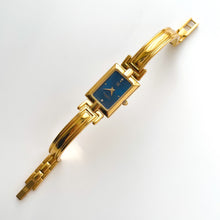 Load image into Gallery viewer, Vintage 1990s Gold-Plated Ladies&#39; Givenchy Bangle Watch with Blue Dial and Quartz Movement
