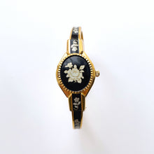 Load image into Gallery viewer, Vintage André Mouche Quartz Watch with Black Enamel Floral Design, Concealead Dial and Gold-Plated Bangle Bracelet
