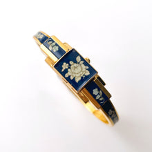 Load image into Gallery viewer, Vintage André Mouche Quartz Watch with Navy Enamel Floral Design, Concealead Dial and Gold-Plated Bangle Bracelet
