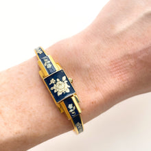 Load image into Gallery viewer, Vintage André Mouche Quartz Watch with Navy Enamel Floral Design, Concealead Dial and Gold-Plated Bangle Bracelet
