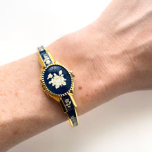 Load image into Gallery viewer, Vintage André Mouche Quartz Watch with Burgundy Enamel Floral Design, Concealead Dial and Gold-Plated Bangle Bracelet
