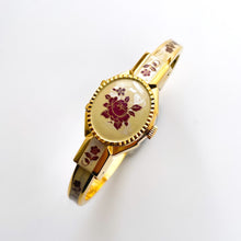 Load image into Gallery viewer, Vintage André Mouche Quartz Watch with Pearl and Burgundy Enamel Floral Design, Concealed Dial and Gold-Plated Bangle Bracelet
