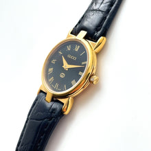 Load image into Gallery viewer, 90s Gold-Plated Ladies&#39; Gucci Quartz Watch with Black Leather Strap - Boxed
