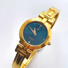 Load image into Gallery viewer, Vintage 1990s Gold-Plated Ladies&#39; Givenchy Bangle Watch with Blue Dial and Quartz Movement
