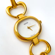 Load image into Gallery viewer, 1990s Gucci Quartz Watch with Mother of Pearl Dial and Semi Bangle Bracelet
