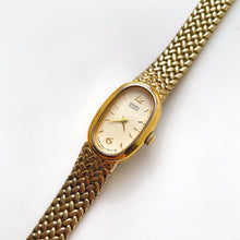 Load image into Gallery viewer, 1990s Ladies&#39; Gold-Tone Seiko Quartz Watch with Oval Dial and Integrated Bracelet
