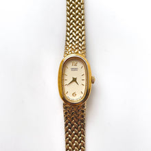 Load image into Gallery viewer, 1990s Ladies&#39; Gold-Tone Seiko Quartz Watch with Oval Dial and Integrated Bracelet
