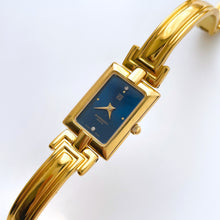 Load image into Gallery viewer, Vintage 1990s Gold-Plated Ladies&#39; Givenchy Bangle Watch with Blue Dial and Quartz Movement
