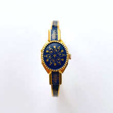 Load image into Gallery viewer, Vintage André Mouche Quartz Watch with Gold and Navy Enamel Floral Design, Concealead Dial and Gold-Plated Bangle Bracelet
