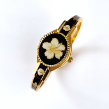 Load image into Gallery viewer, Vintage André Mouche Quartz Watch with Black Enamel Floral Design, Concealead Dial and Gold-Plated Bangle Bracelet
