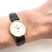 Load image into Gallery viewer, Vintage 1990s Gold-Plated Ladies&#39; Givenchy Quartz Watch with Black Leather Strap
