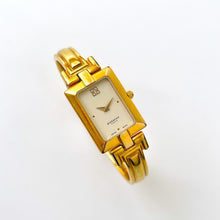 Load image into Gallery viewer, Vintage 1990s Gold-Plated Ladies&#39; Givenchy Bangle Quartz Watch with Rectangular Dial
