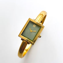 Load image into Gallery viewer, Vintage 90s Yves Saint Laurent Ladies&#39; Bangle Style Quartz Watch with Gold-Tone Bracelet and Green Dial
