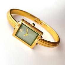 Load image into Gallery viewer, Vintage 90s Yves Saint Laurent Ladies&#39; Bangle Style Quartz Watch with Gold-Tone Bracelet and Green Dial
