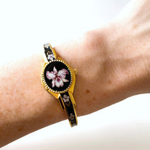 Load image into Gallery viewer, Vintage André Mouche Quartz Watch with Black and Purple Enamel Floral Design, Concealead Dial and Gold-Plated Bangle Bracelet
