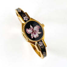 Load image into Gallery viewer, Vintage André Mouche Quartz Watch with Black and Purple Enamel Floral Design, Concealead Dial and Gold-Plated Bangle Bracelet
