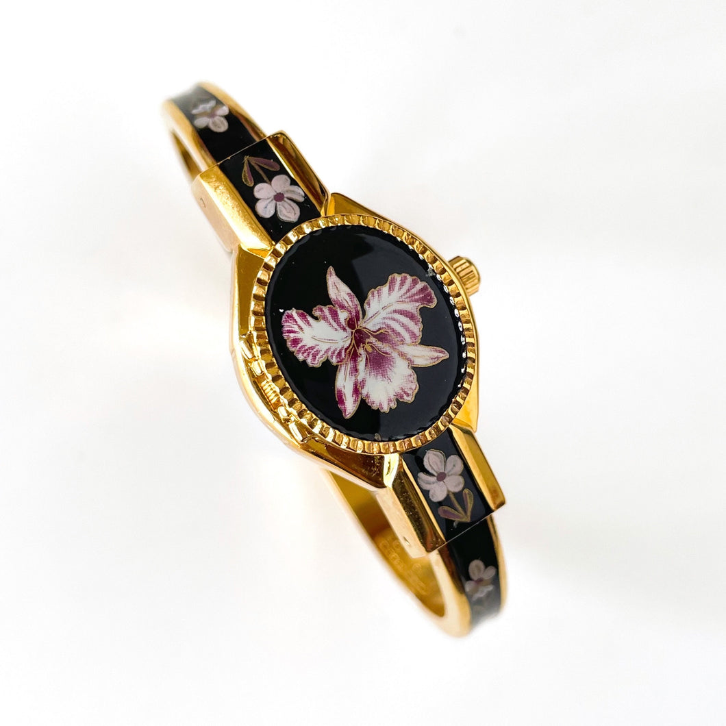 Vintage André Mouche Quartz Watch with Black and Purple Enamel Floral Design, Concealead Dial and Gold-Plated Bangle Bracelet