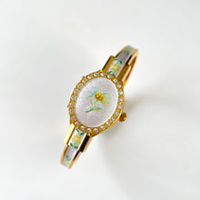 Load image into Gallery viewer, Vintage André Mouche Quartz Watch with Enamel Floral Design, Concealead Dial and Gold-Plated Bangle Bracelet
