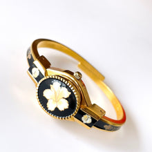 Load image into Gallery viewer, Vintage André Mouche Quartz Watch with Black Enamel Floral Design, Concealead Dial and Gold-Plated Bangle Bracelet
