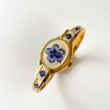 Load image into Gallery viewer, Vintage André Mouche Quartz Watch with Beige and Blue Enamel Floral Design, Concealead Dial and Gold-Plated Bangle Bracelet
