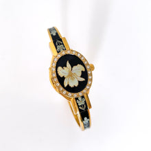 Load image into Gallery viewer, Vintage André Mouche Quartz Watch with Black Enamel Floral Design, Concealead Dial and Gold-Plated Bangle Bracelet
