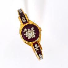 Load image into Gallery viewer, Vintage André Mouche Quartz Watch with Burgundy Enamel Floral Design, Concealead Dial and Gold-Plated Bangle Bracelet
