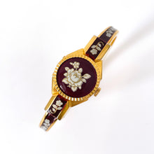 Load image into Gallery viewer, Vintage André Mouche Quartz Watch with Burgundy Enamel Floral Design, Concealead Dial and Gold-Plated Bangle Bracelet
