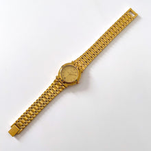 Load image into Gallery viewer, Vintage Gold-Plated Gucci Quartz Watch with Round Dial and Date Window
