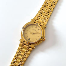 Load image into Gallery viewer, Vintage Gold-Plated Gucci Quartz Watch with Round Dial and Date Window
