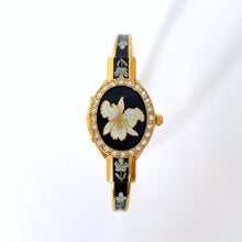 Load image into Gallery viewer, Vintage André Mouche Quartz Watch with Black Enamel Floral Design, Concealead Dial and Gold-Plated Bangle Bracelet
