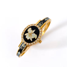 Load image into Gallery viewer, Vintage André Mouche Quartz Watch with Black Enamel Floral Design, Concealead Dial and Gold-Plated Bangle Bracelet
