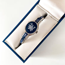 Load image into Gallery viewer, Vintage André Mouche Quartz Watch with Navy Enamel Floral Design, Concealead Dial and Silver-Tone Bangle Bracelet
